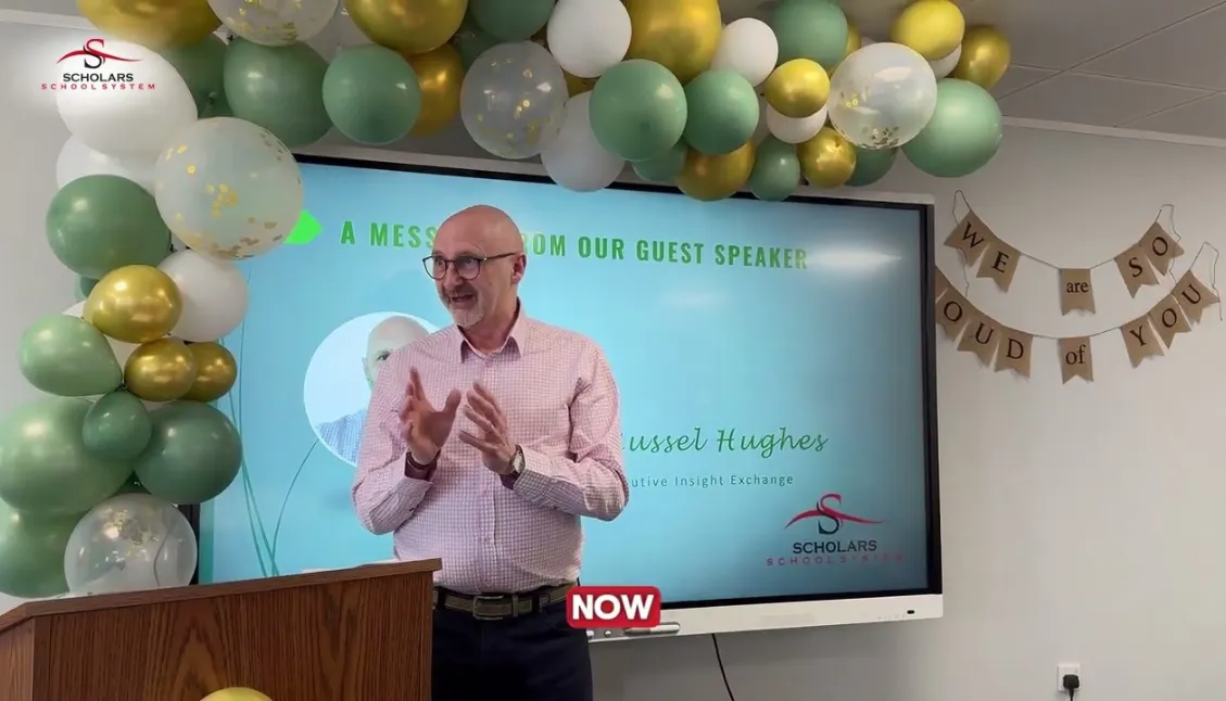 Martin Russell Hughes Business Coach at Student Recognition Event | Scholars School System
